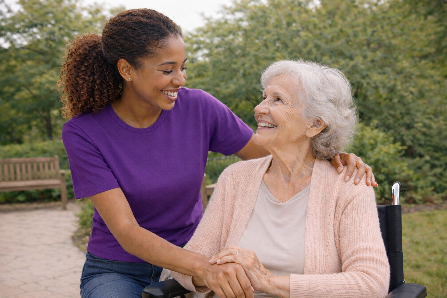 Caregiver with elderly woman in wheelchair | senior home care Center City Philadelphia | Neighborly Home Care